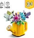 FLORES EN REGADERA
